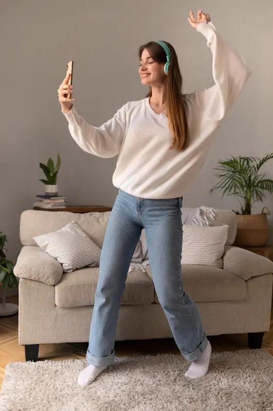 Adult beginners following an online dance lesson at home